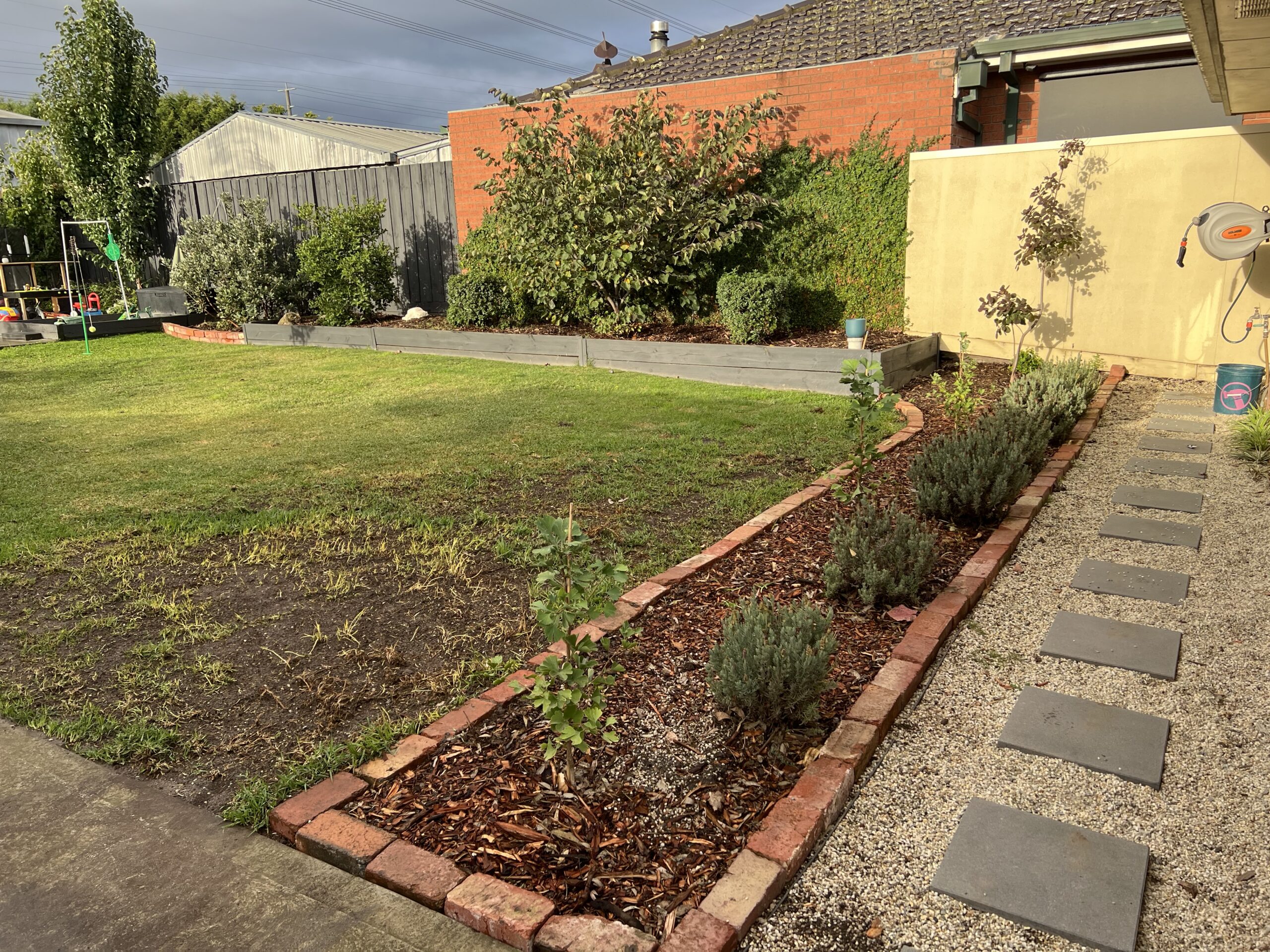 Garden beds after mulch deliveries have been spread
